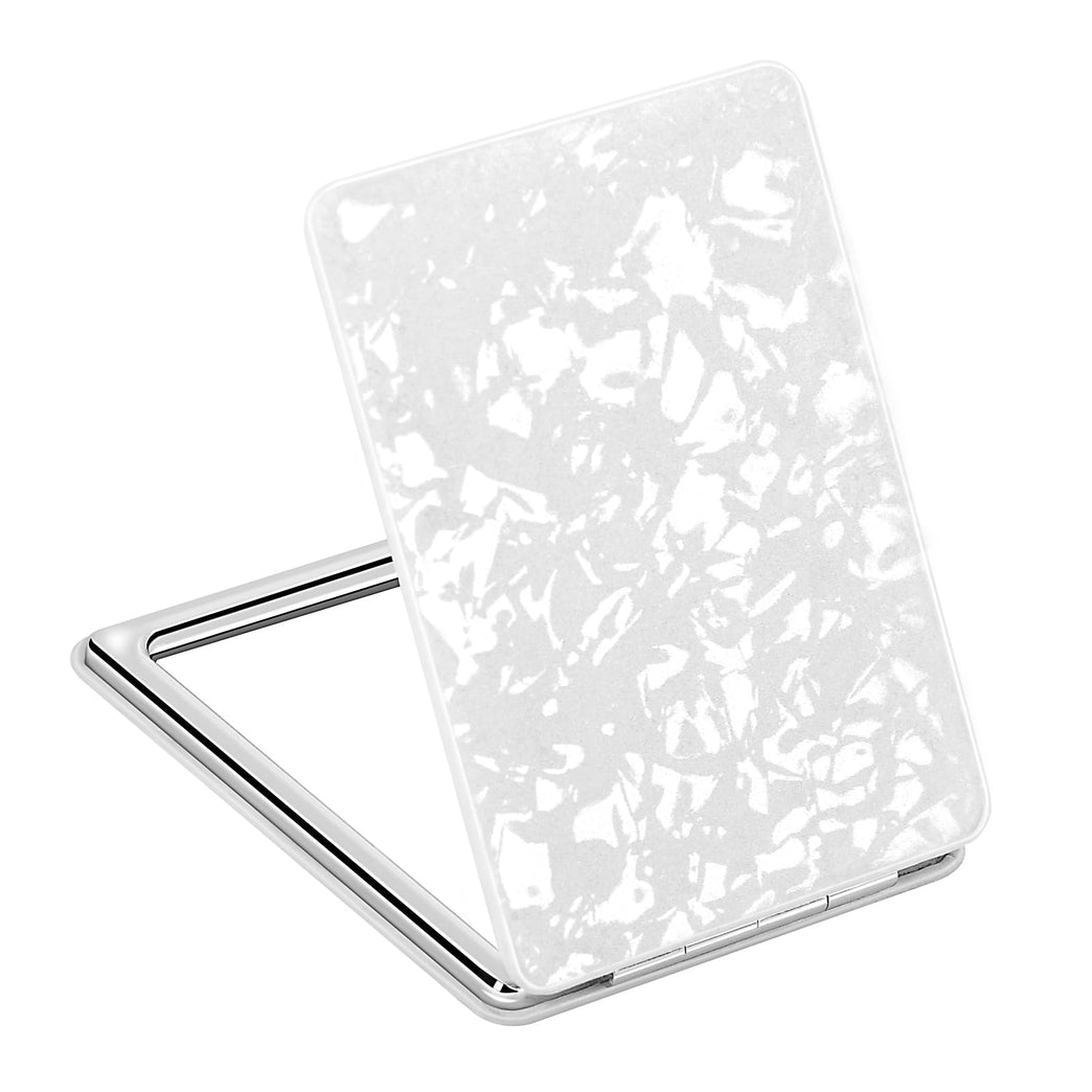 Elegant White Compact Travel Makeup Mirror with Magnifying Feature and 3D Shell Pattern