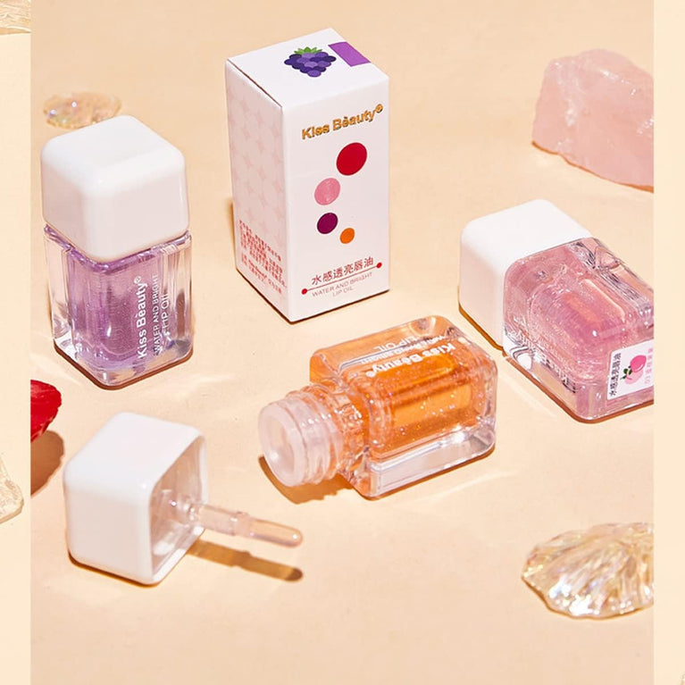 4-Piece Shimmering Lip Gloss and Balm Set - Hydrating and Plumping Lip Care Set with Transparent Toot Lip Oil, Moisturizing Lipstick, and Tinted Lip Tint Makeup